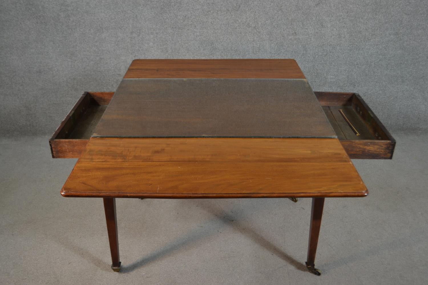 A 19th century mahogany Pembroke table, the top with drop leaves and a moulded edge, over two end - Image 5 of 6