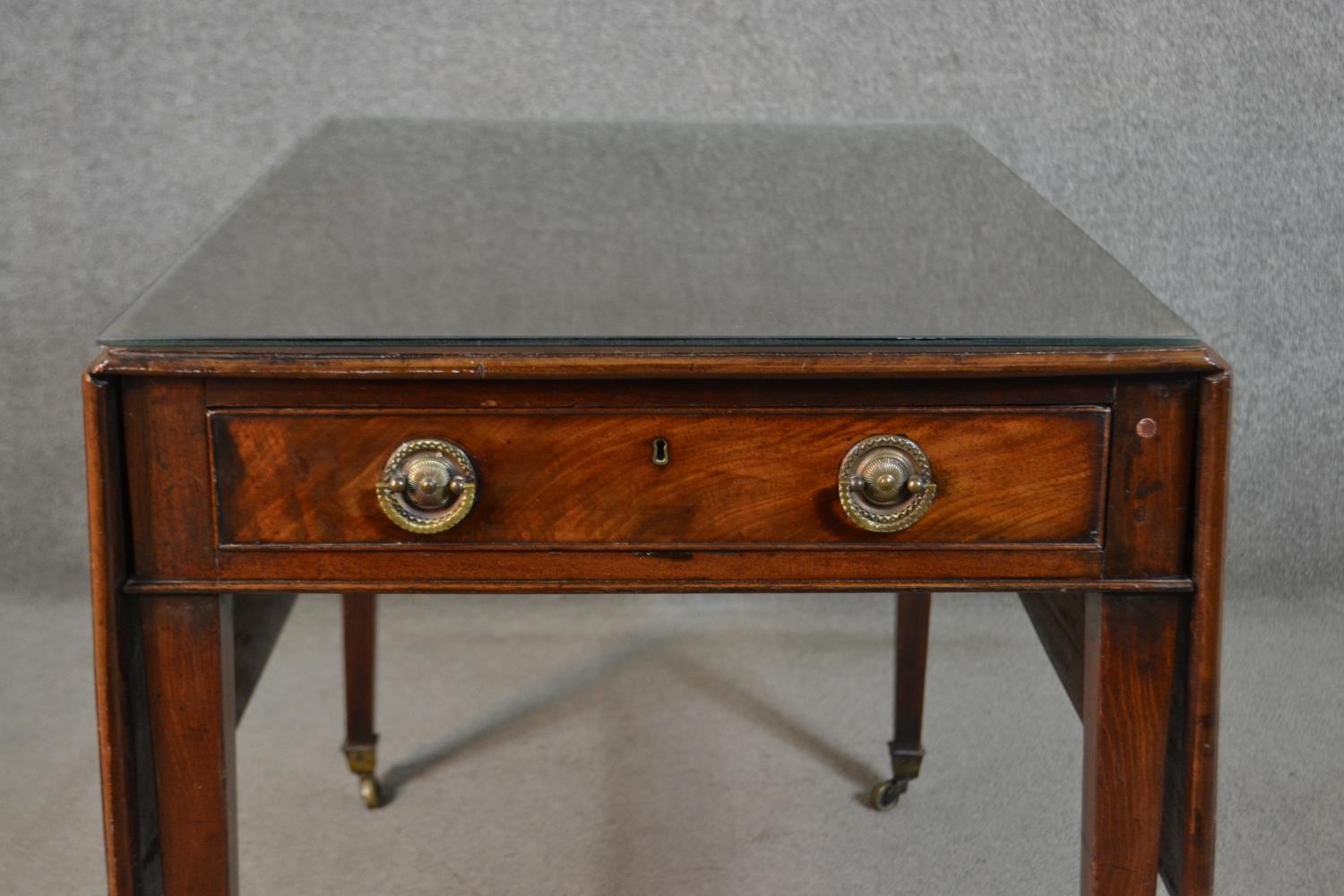 A 19th century mahogany Pembroke table, the top with drop leaves and a moulded edge, over two end - Image 2 of 6