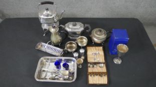 A collection of silver plate, including various cutlery, a spirit kettle with stand, silver plated