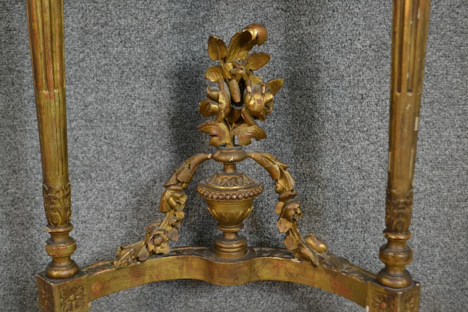 A carved gilt console table with demi lune pink marble top above fluted tapering supports and all - Image 6 of 7