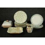 A collection of porcelain including, a set of five Wedgwood embossed queens ware plates with vine