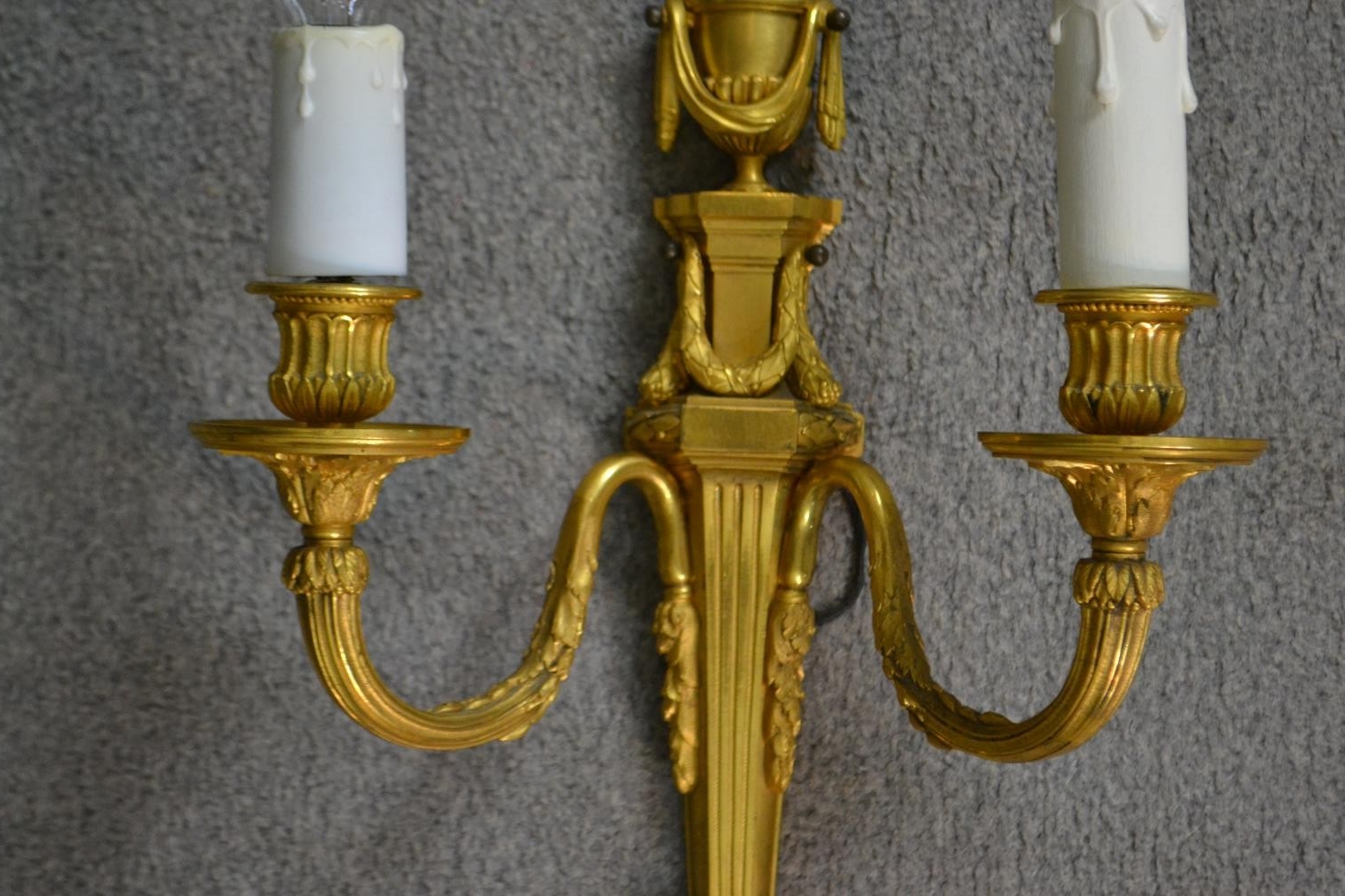 A pair of 19th century gilt metal two branch wall sconces with swag and foliate design. H.39 W.49cm - Image 4 of 6