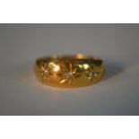 An 18ct yellow gold and old mine diamond gypsy ring, set with three cushion shaped old mine diamonds
