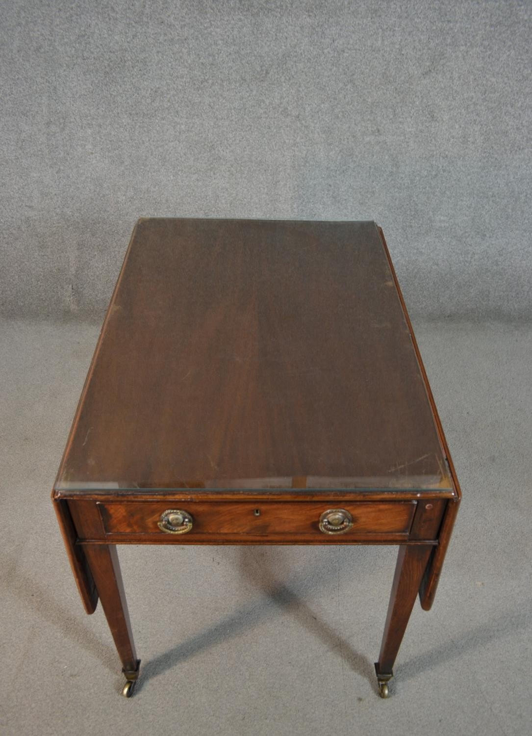 A 19th century mahogany Pembroke table, the top with drop leaves and a moulded edge, over two end - Image 3 of 6