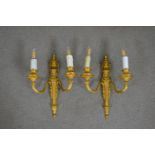 A pair of 19th century gilt metal two branch wall sconces with swag and foliate design. H.39 W.49cm