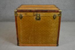 A late 19th/early 20th century steamer trunk, similar to those made by Louis Vuitton, with a printed