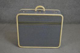 A Vintage Suitcase by Oshkosh with printed monogram. H.49 W.56 D.23cm