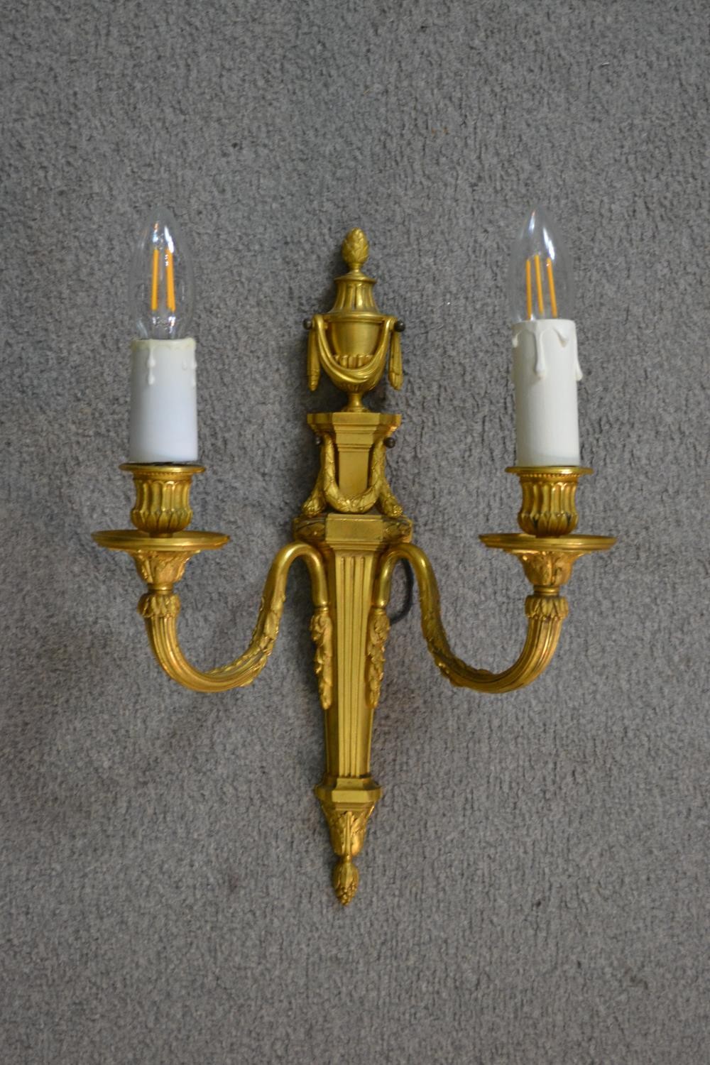 A pair of 19th century gilt metal two branch wall sconces with swag and foliate design. H.39 W.49cm - Image 3 of 6