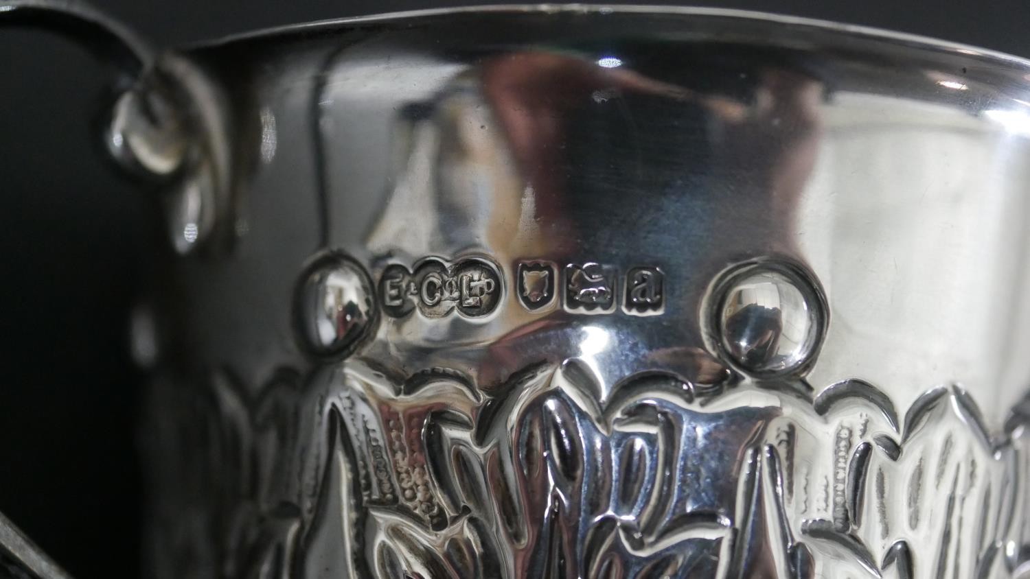 A collection of silver, including a repousse Art Nouveau design twin handled cup, a silver mustard - Image 6 of 12