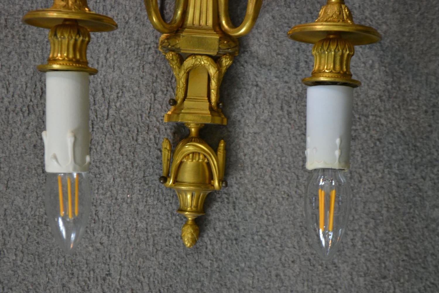 A pair of 19th century gilt metal two branch wall sconces with swag and foliate design. H.39 W.49cm - Image 5 of 6