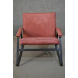 A pair of mid to late 20th century armchairs, purchased from Heal's, with a steel frame, upholstered