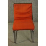Gordon Russell for Verco, an office chair, upholstered in red fabric, with a leather frame, on