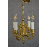 A 19th century gilt metal four branch foliate design chandelier. H.36 W.24cm