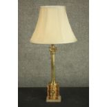 A 20th century Italian marble and brass Corinthian column table lamp, the marble base with a brass