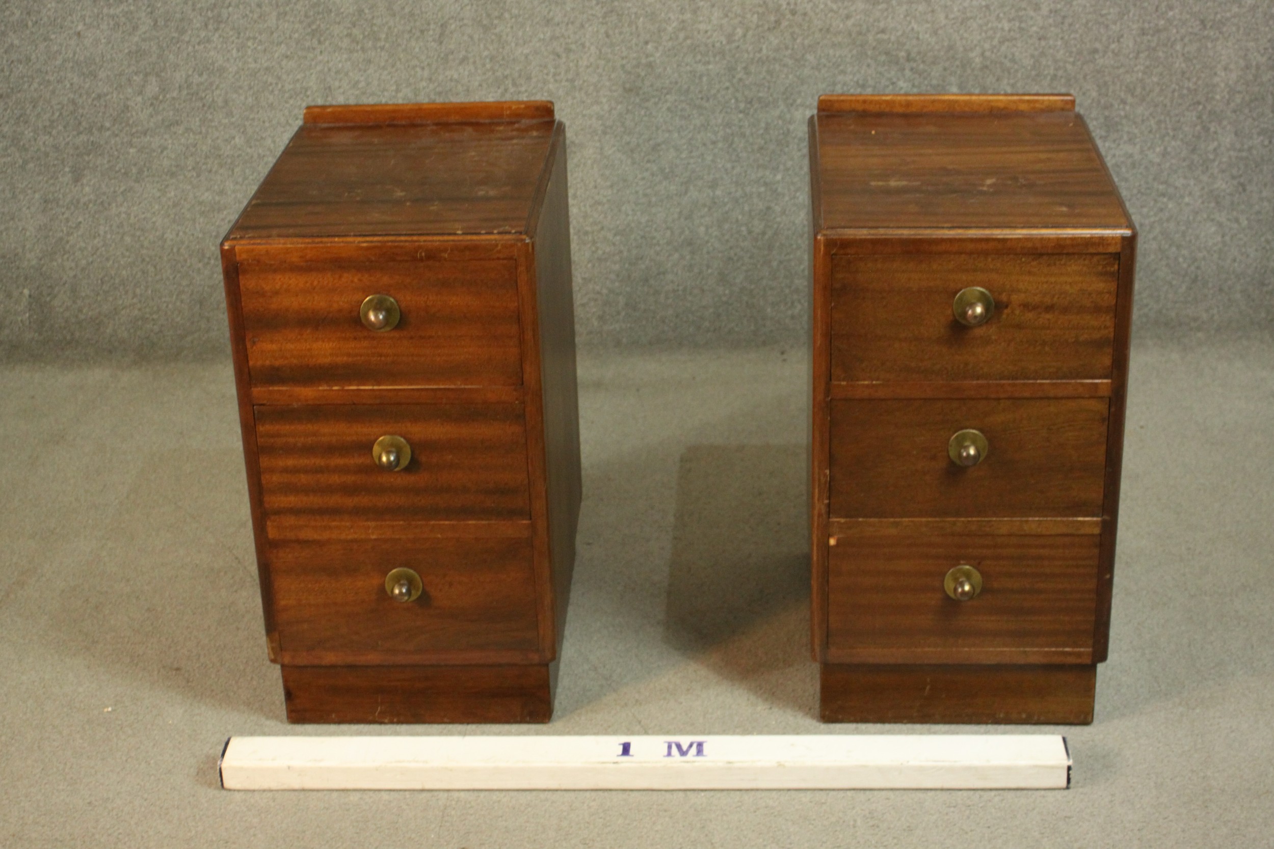 A pair of mid 20th century bedside chests, with a gallery back over three long drawers, on a - Image 2 of 6