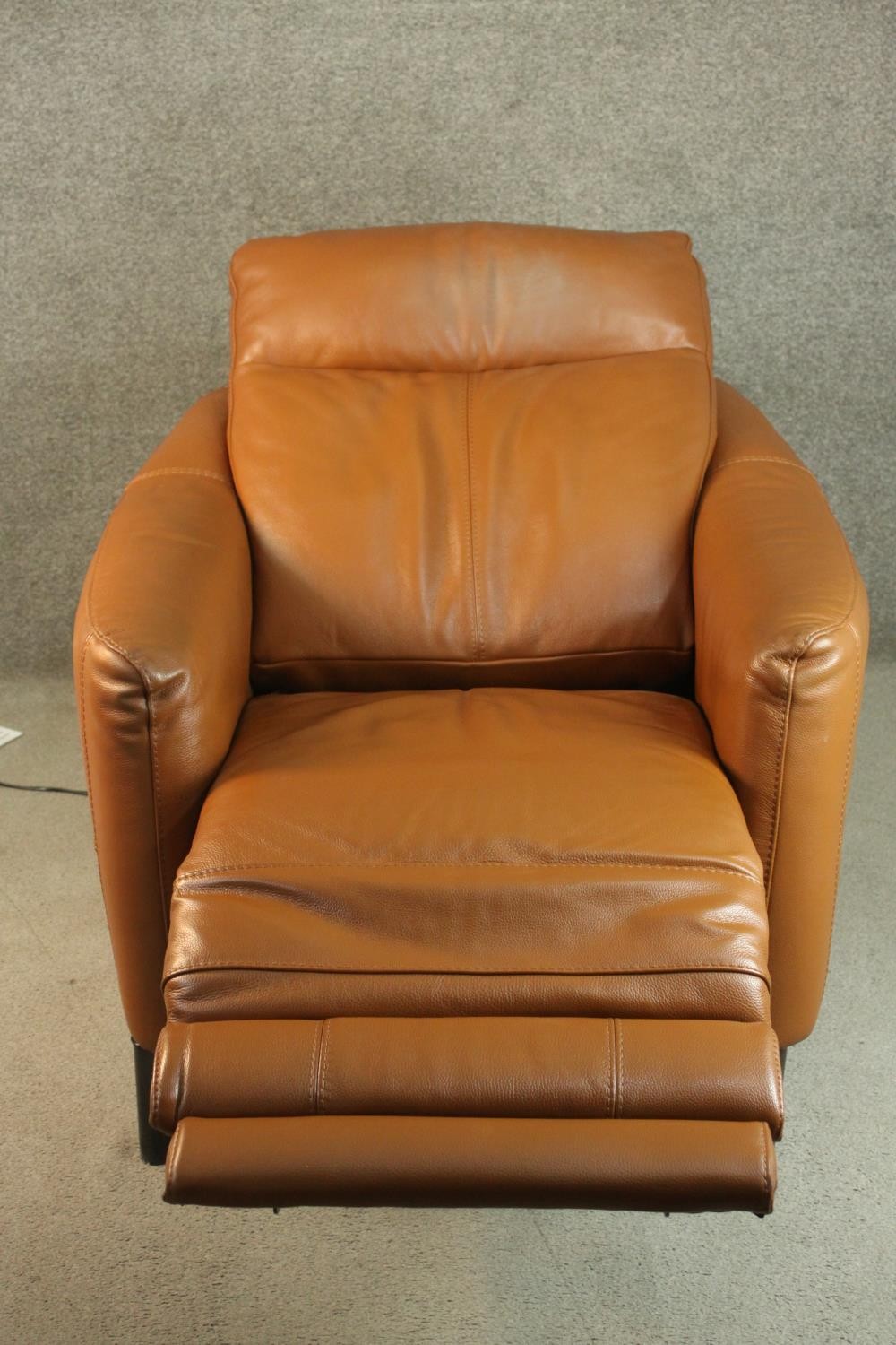 A contemporary tan leather electric reclining armchair, possibly Natuzzi, with instructions. In good - Image 3 of 10