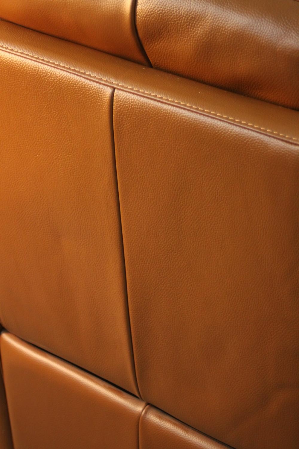A contemporary tan leather electric reclining armchair, possibly Natuzzi, with instructions. In good - Image 8 of 10