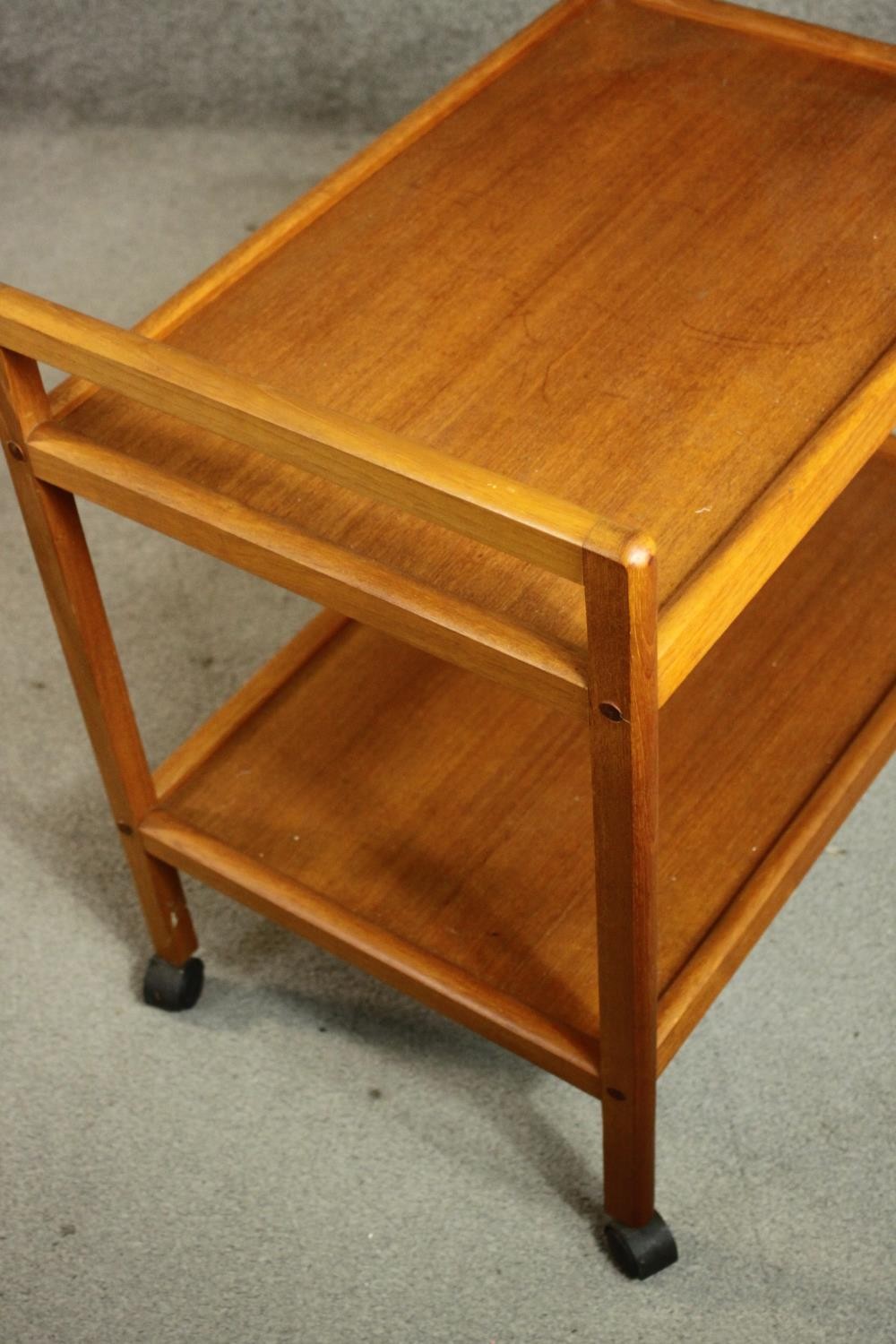 A circa 1970s Danish teak tea trolley, with two tiers, stamped 'Made in Denmark' to the underside. - Image 5 of 8