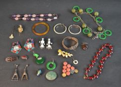 A collection of costume jewellery including an amethyst and rose quartz bead necklace, Bakelite jade