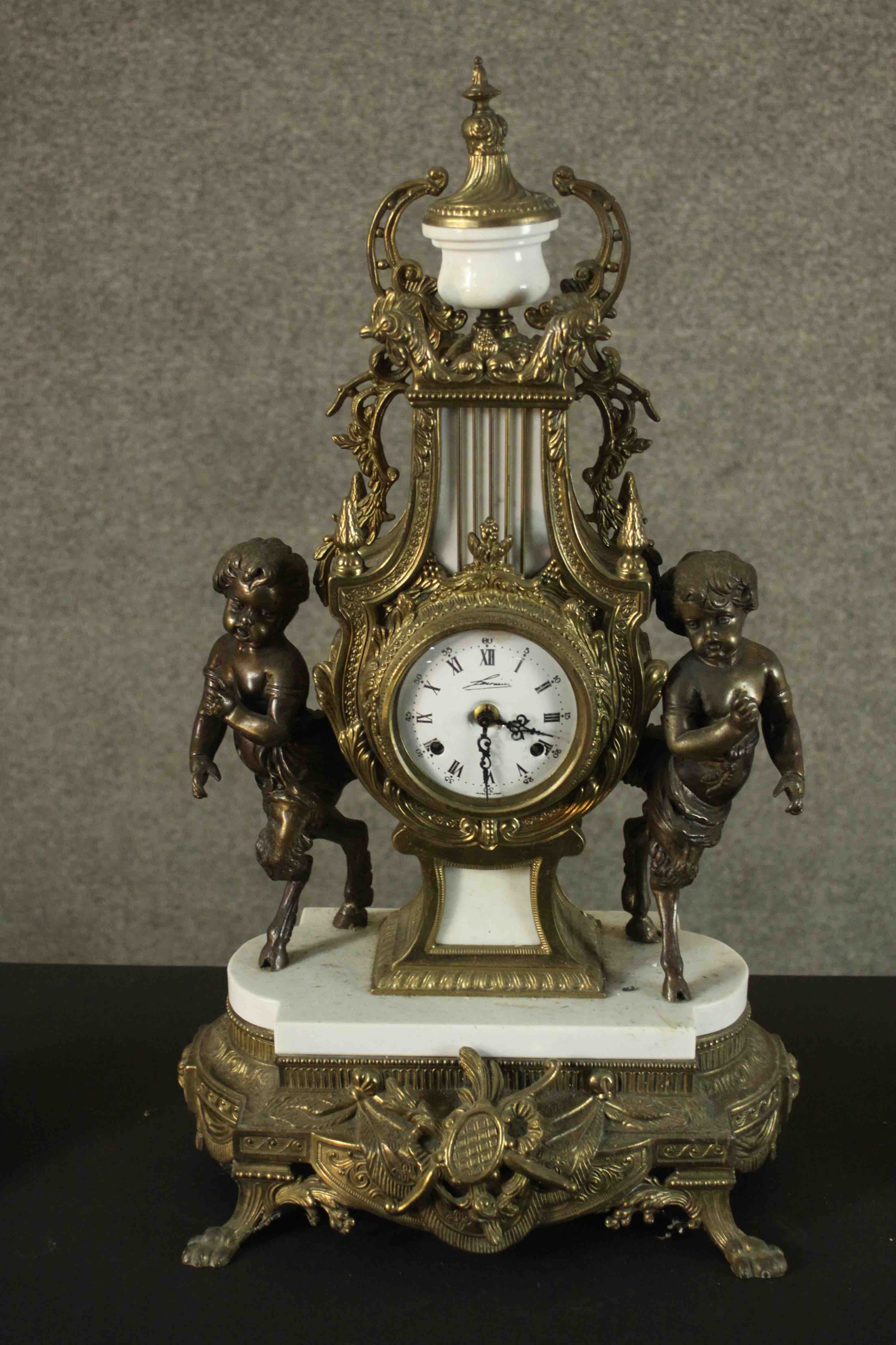 A 20th century Italian gilt metal clock garniture, the clock of lyre form with an enamelled dial - Image 3 of 15