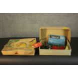 A boxed vintage French child's construction set 'Constuitout' along with an early 20th century boxed