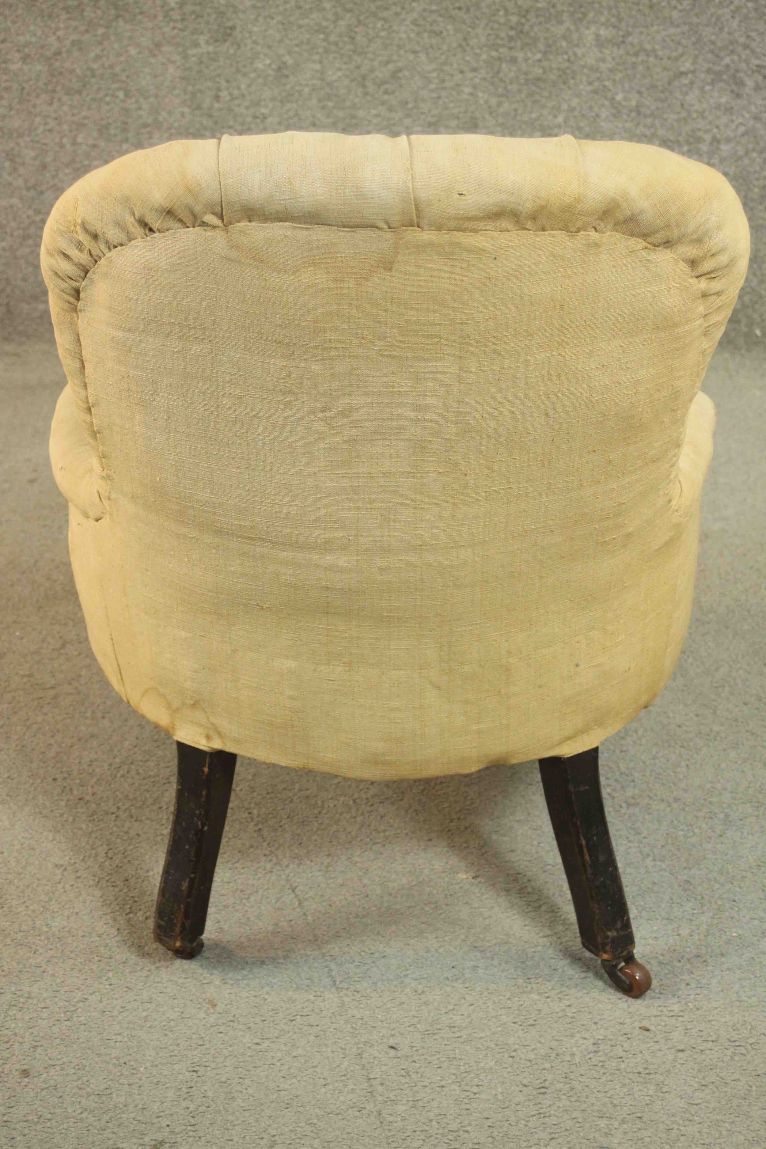 A Victorian nursing chair, upholstered in beige fabric with buttoned back and arms, on turned - Image 5 of 7