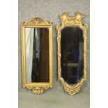 Two mid to late 20th century gilt framed pier mirrors, of slender form, both with moulded shell