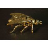 A boxed Hamilton Comte 'Abeille' gilt metal fly design trinket box with hinged wings. H.3 W.9 D.4.