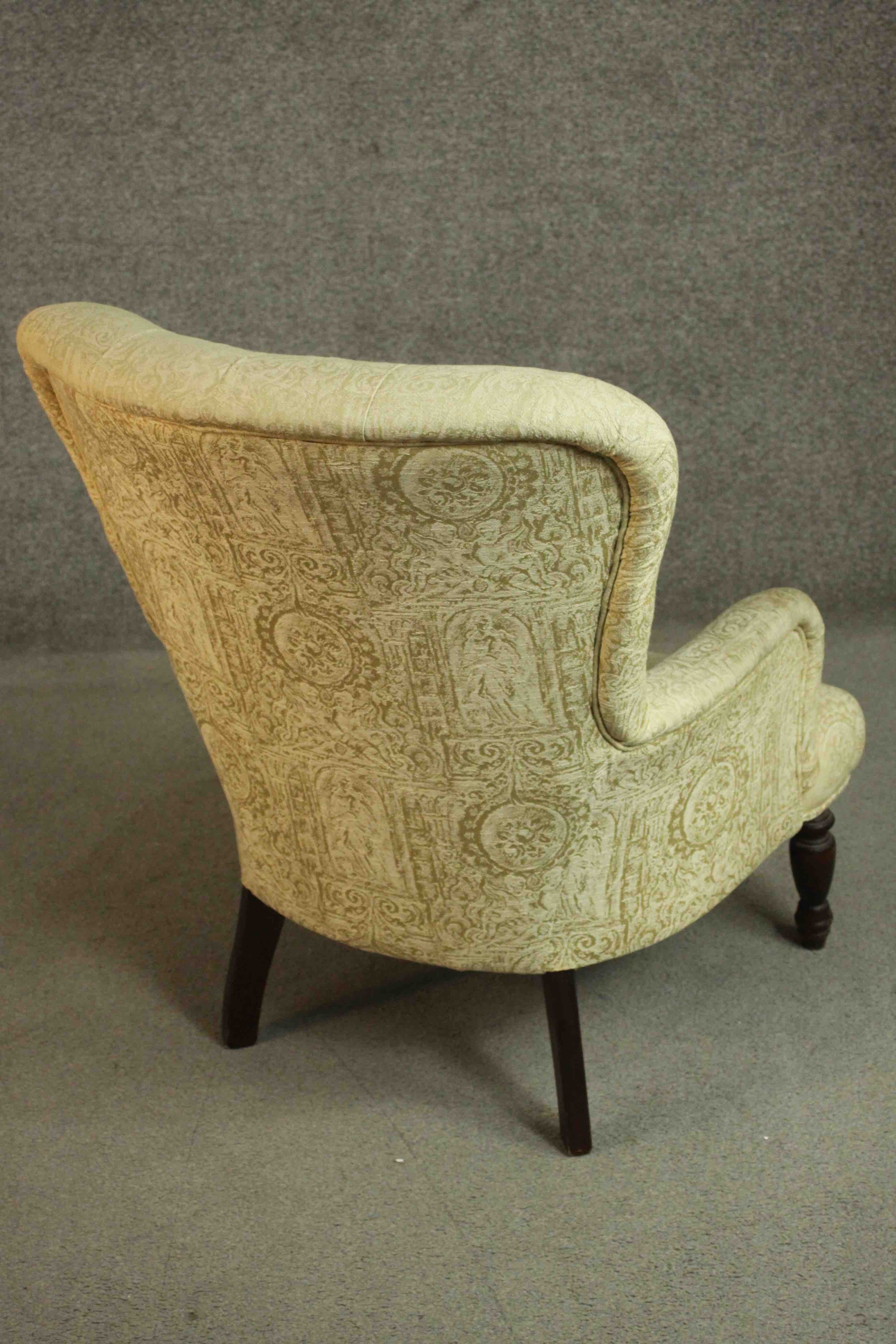 A Victorian mahogany armchair, upholstered in buttoned yellow fabric, on turned legs. - Image 4 of 6