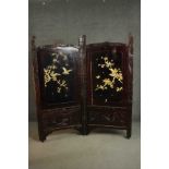A late 19th or early 20th century Japanese two fold lacquered screen with carved bone inlaid