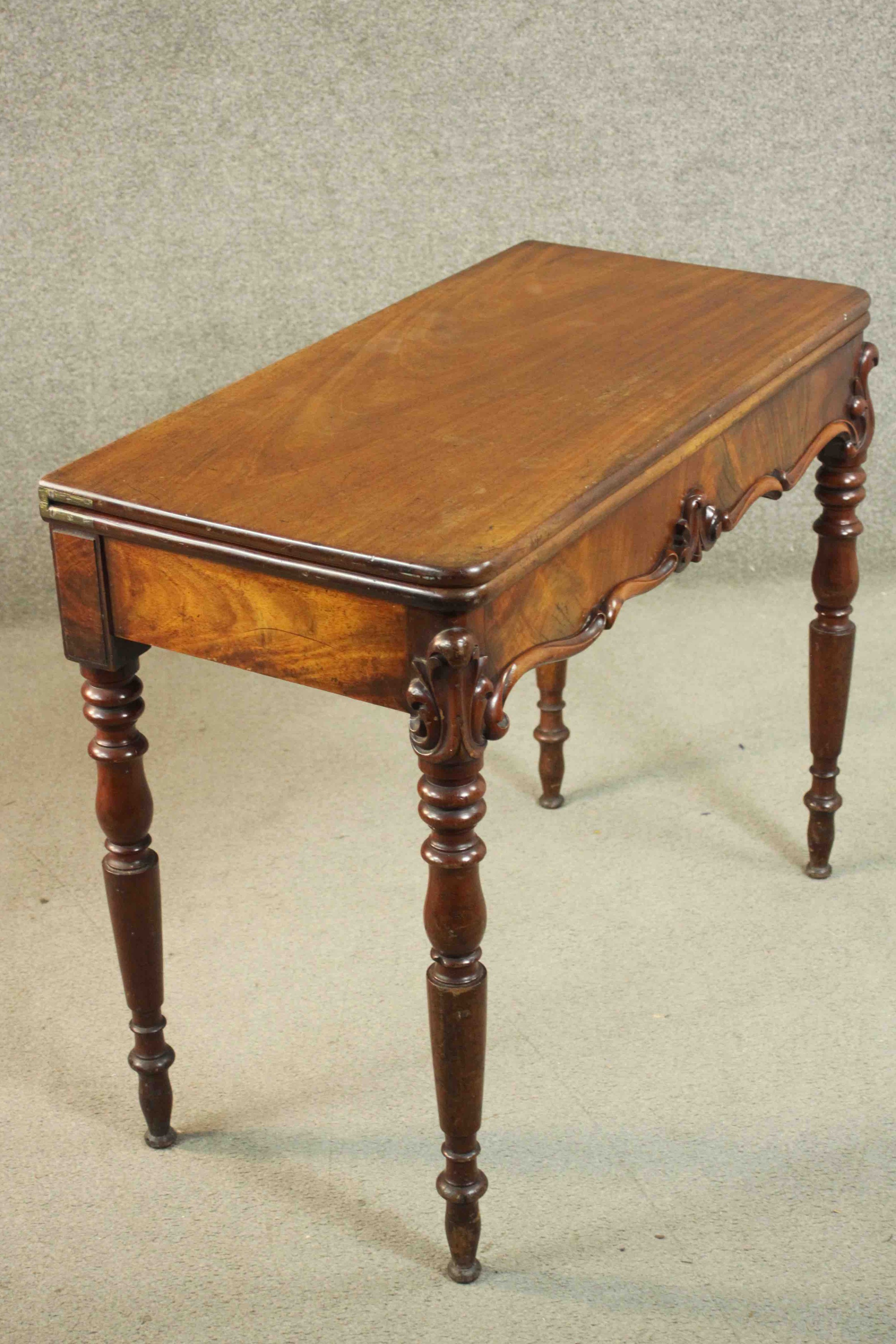 A Victorian mahogany tea table, of rectangular form with a foldover top over a shaped frieze with - Image 4 of 12