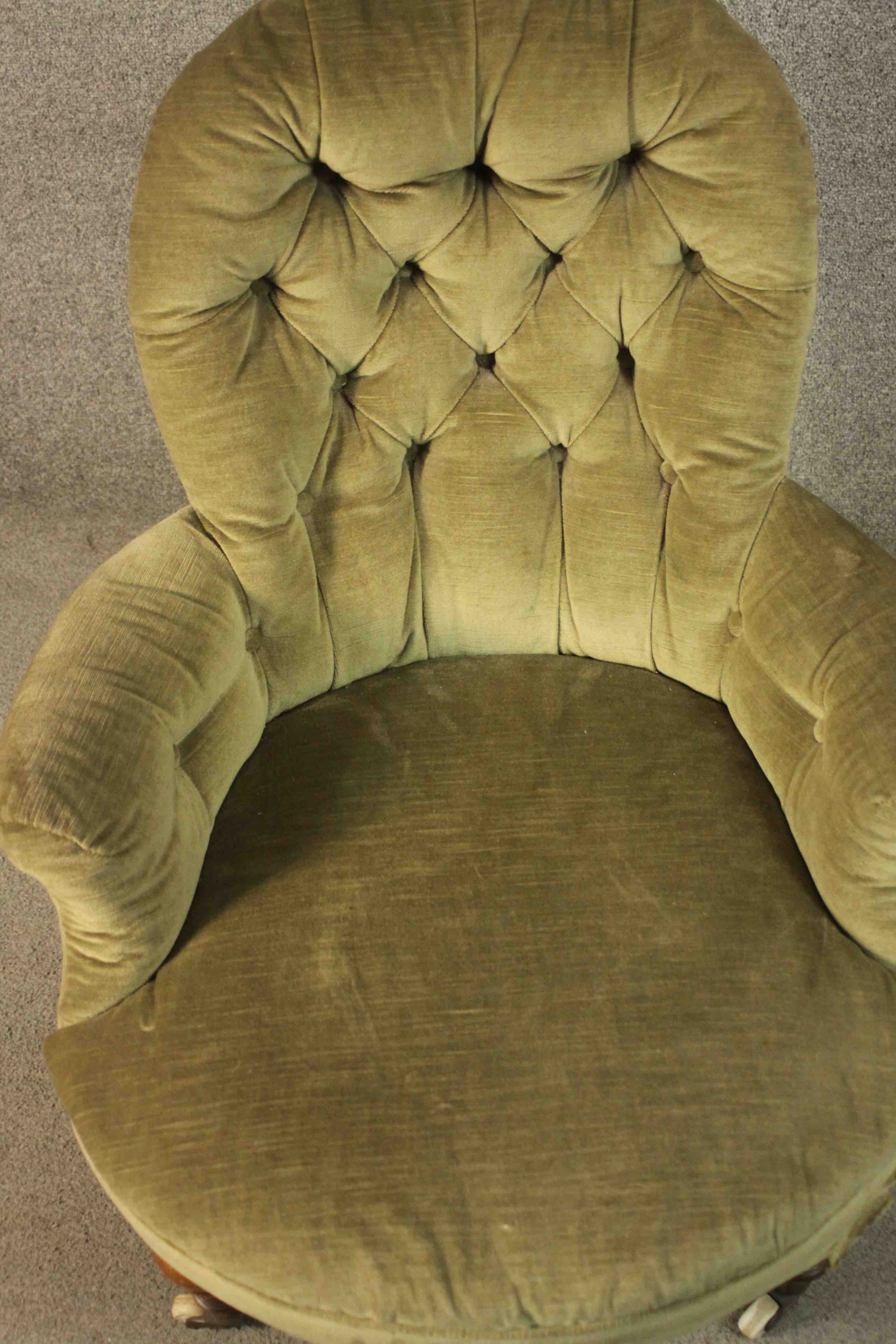 A Victorian armchair, upholstered in green velour with a buttoned back and arms, on turned walnut - Image 3 of 7