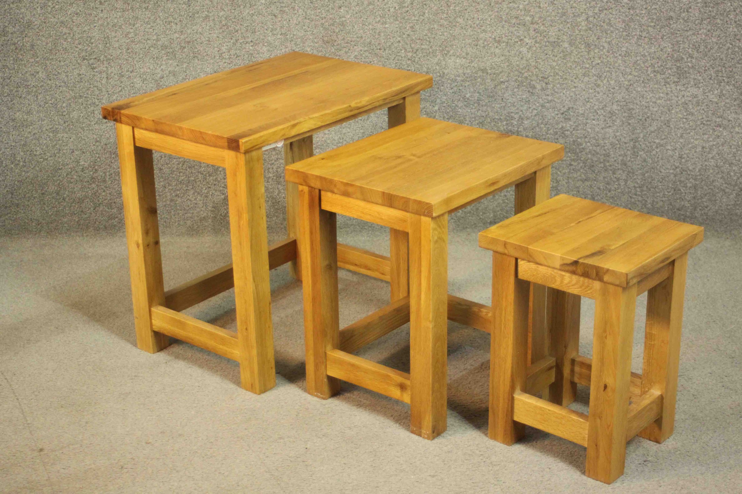 A contemporary oak nest of three occasional low tables of rectangular form on square section legs - Image 5 of 6
