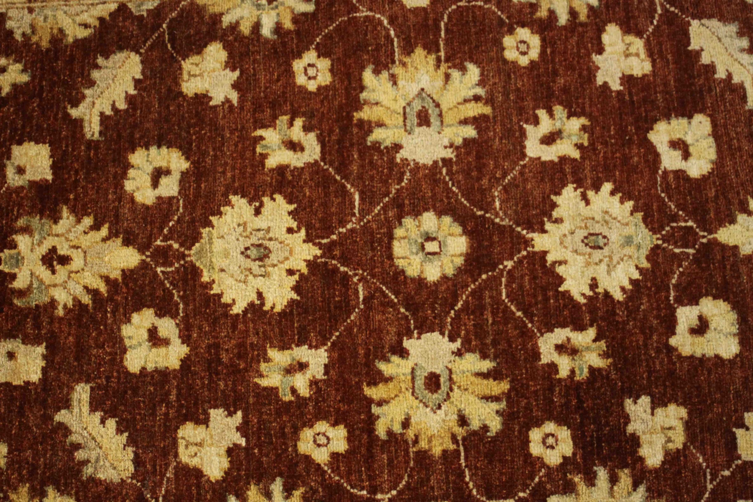 A Ziegler style rug with repeating foliate motifs on a burgundy field within serrated palm - Image 3 of 5