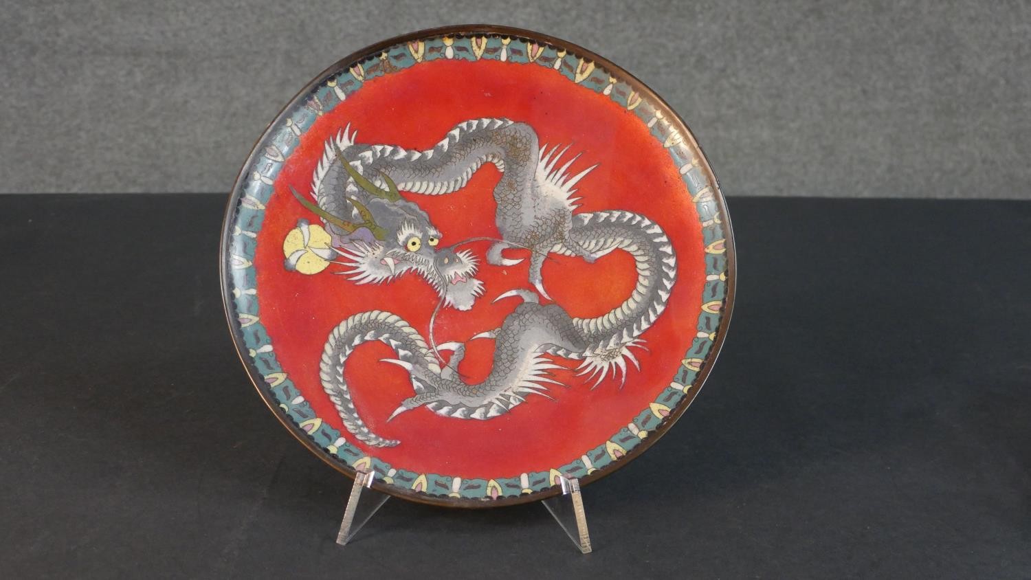 A collection of seven Meji Period Japanese cloisonné plates. Two with a dragon design on red - Image 6 of 16