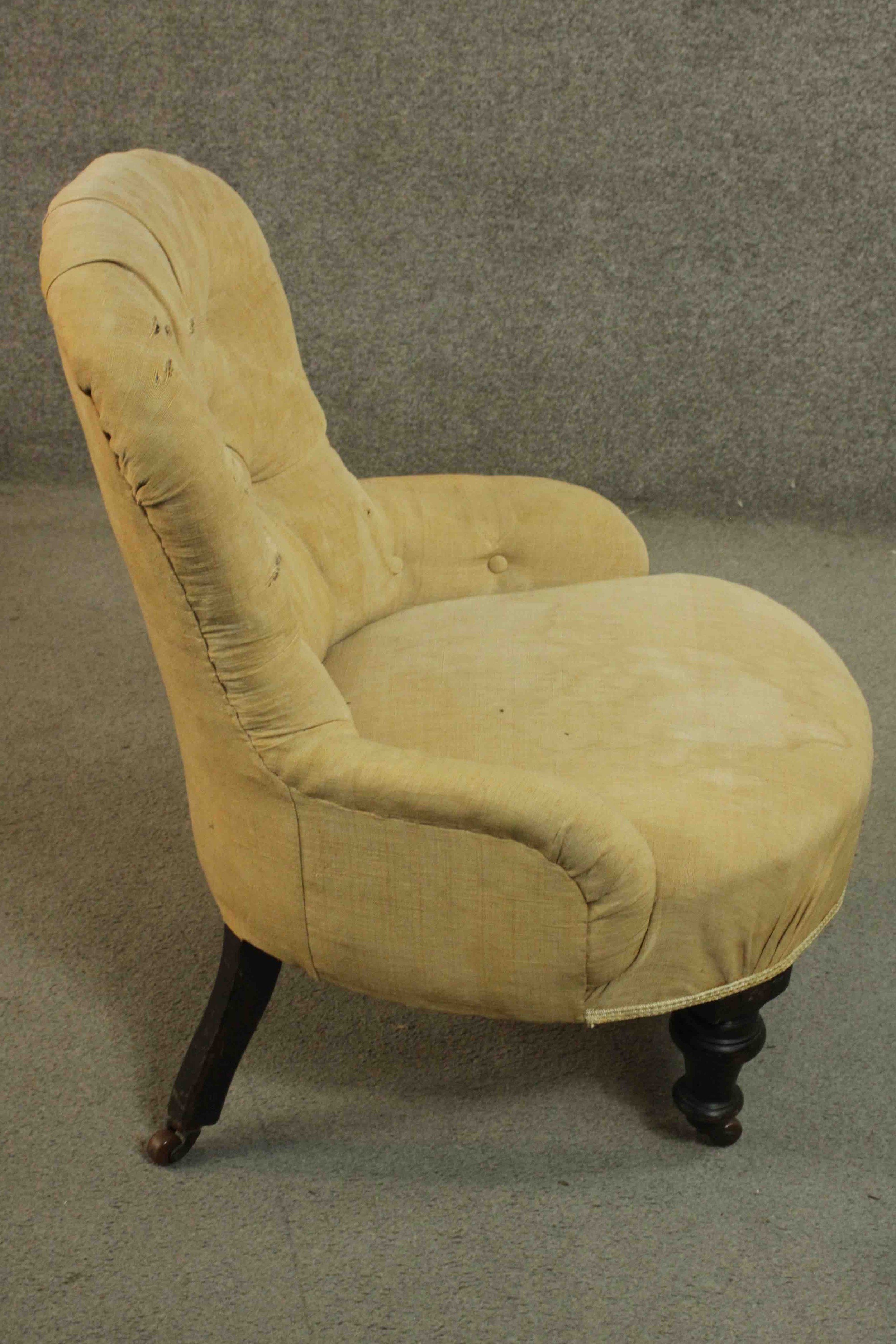 A Victorian nursing chair, upholstered in beige fabric with buttoned back and arms, on turned - Image 3 of 7
