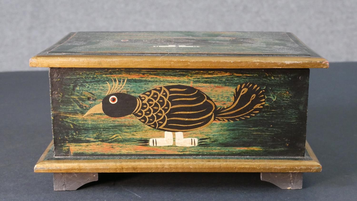 An Indian painted bird jewellery box with fold out mirror and draw along with a pair of turned - Image 4 of 8