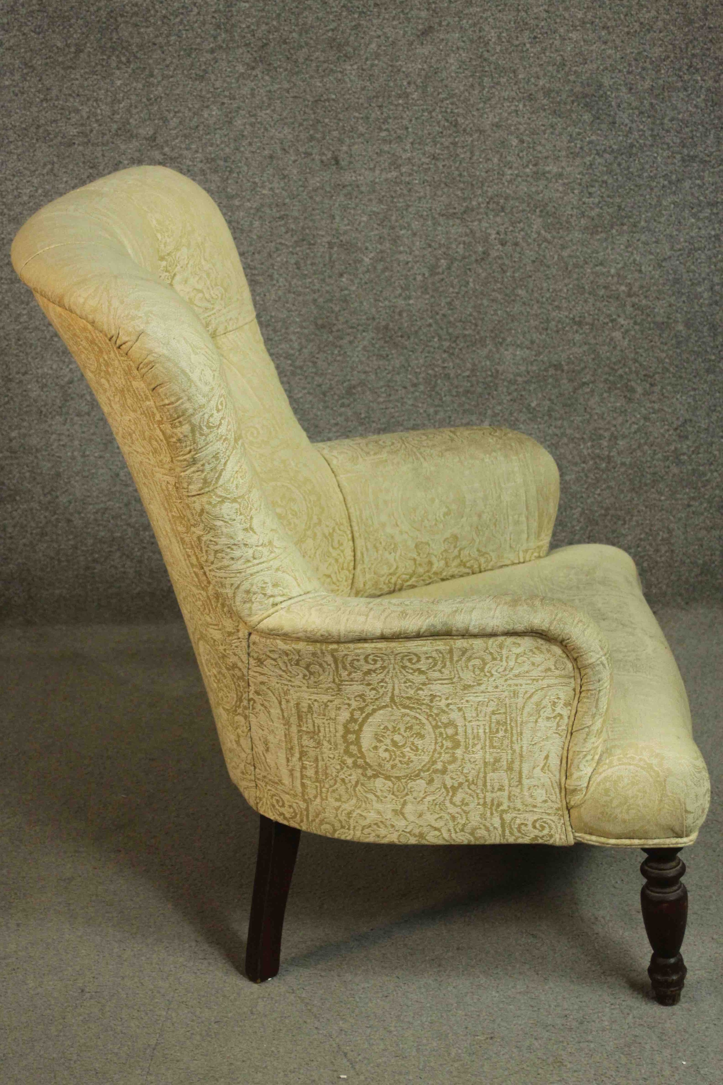 A Victorian mahogany armchair, upholstered in buttoned yellow fabric, on turned legs. - Image 3 of 6