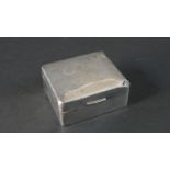 A weighted silver cedar lined square cigarette box. Hallmarked: WN Ltd for William Neale,