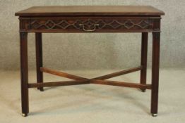 A Chippendale style 18th century and later mahogany side table, the rectangular crossbanded top over