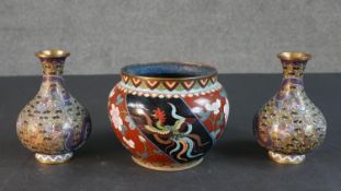 A pair of Japanese Cloisonné enamel brass vases with dragon and cloud design along with a phoenix