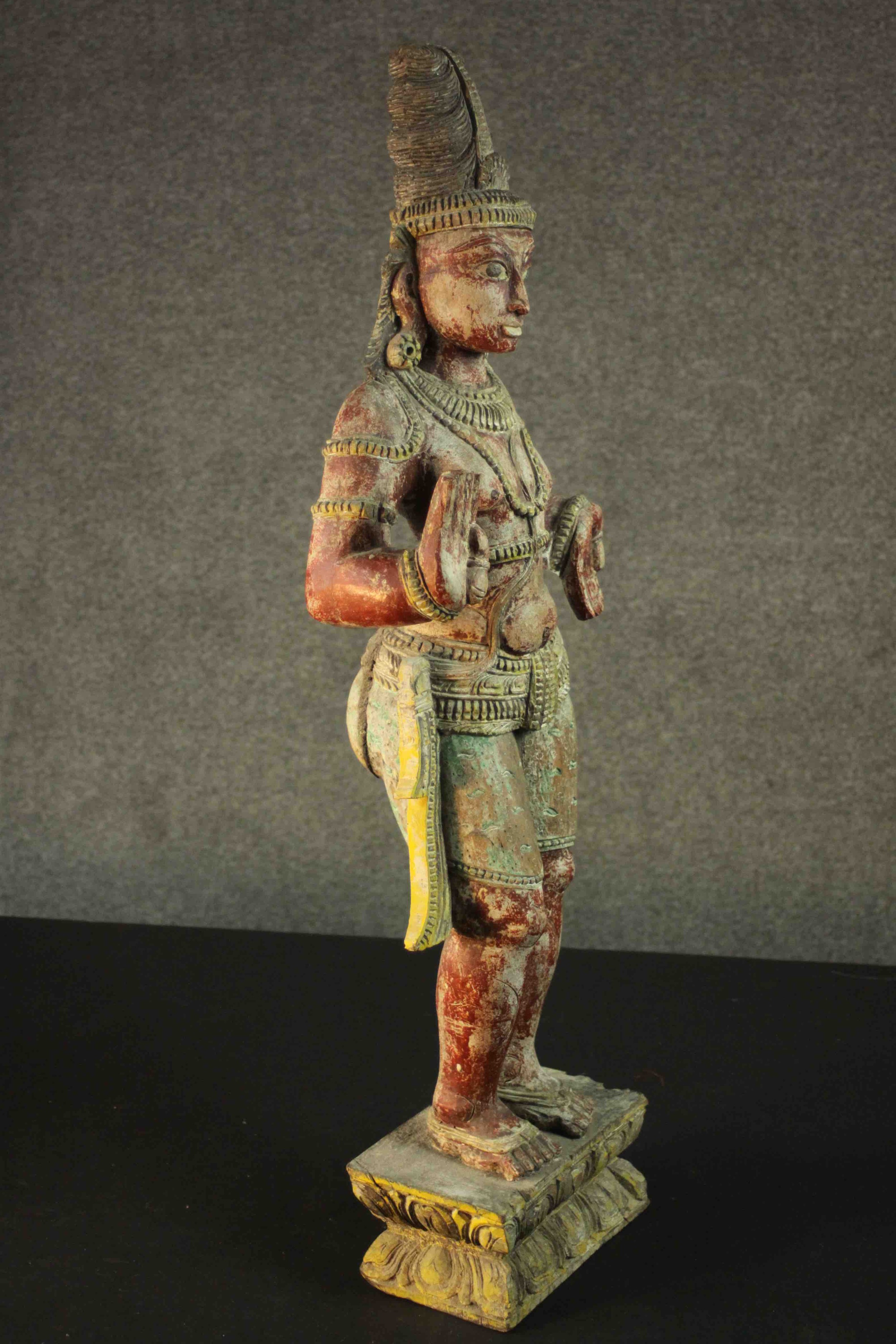 A large carved and painted 19th century Oriental statue of a deity standing on a rectangular lotus - Image 6 of 11
