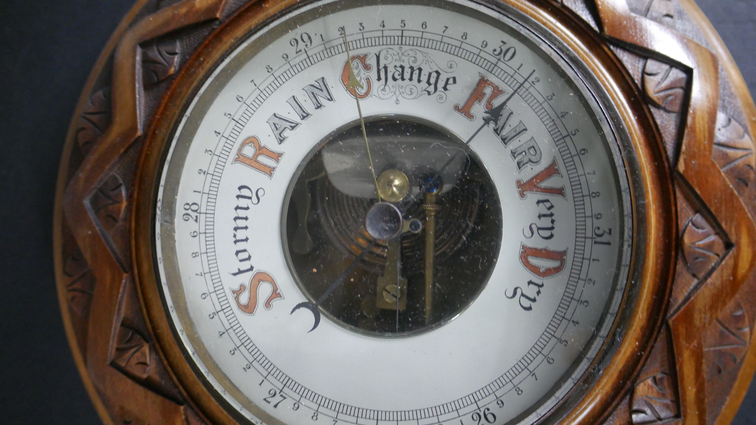 An early 20th century carved oak Barometer with enamel dial along with a marquetry shield - Image 3 of 6