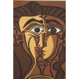 After Picasso, a framed and glazed Lino cut, head of a woman. H.46 W.36cm.