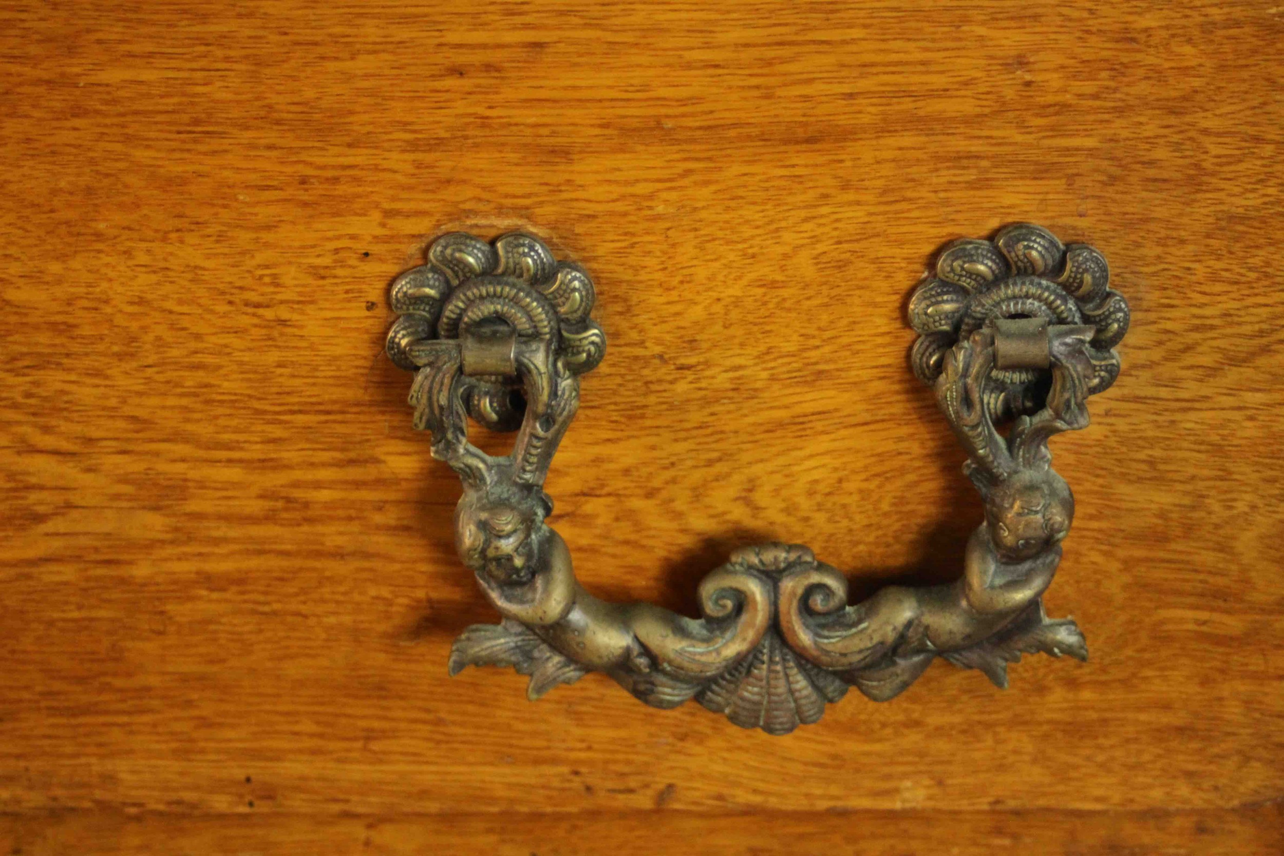 A late 19th/early 20th century oak chest of four long drawers with ornately cast bronze swing - Image 3 of 8