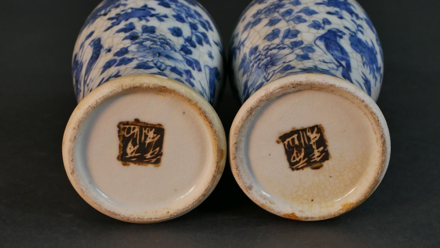 A pair of early 20th century Chinese blue and white crackle glazed vases and covers. The lidded jars - Image 8 of 8