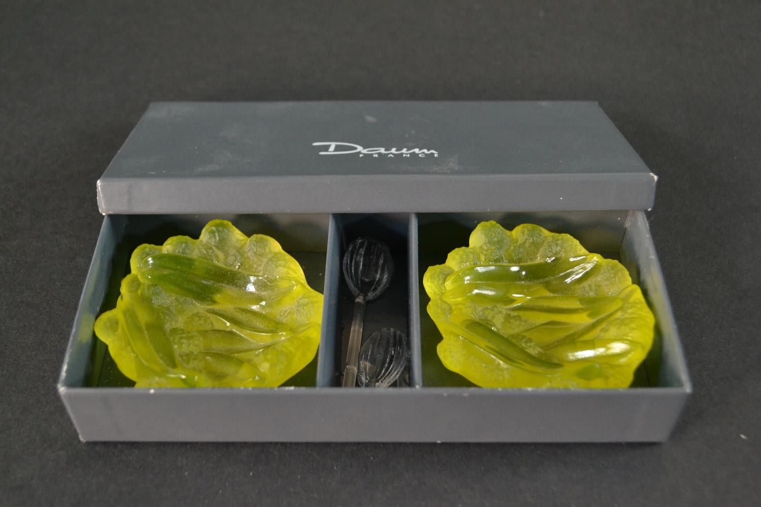 A boxed pair of Daum mini 'Mimosa' design uranium glass salts with glass spoons (one broken). Signed - Image 2 of 8