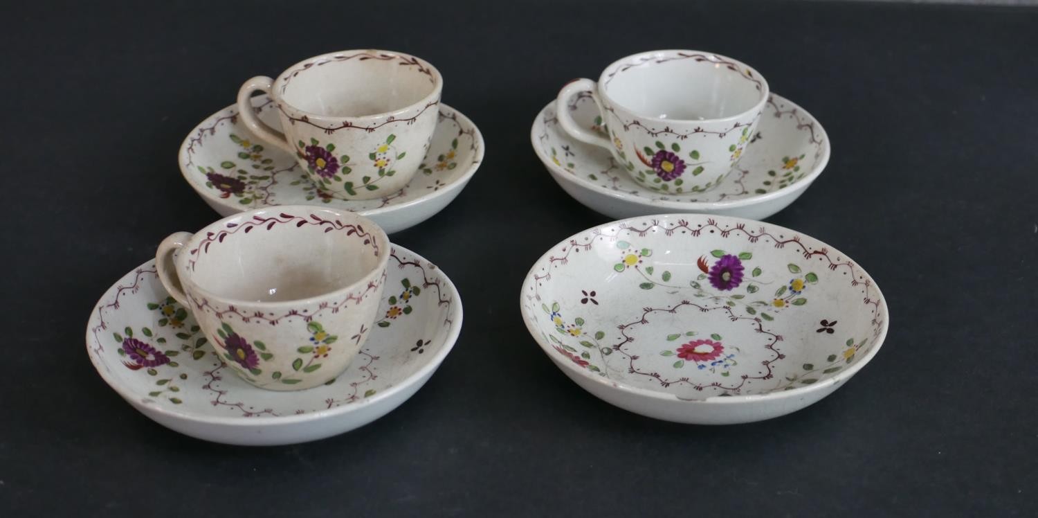 A 19th century floral design hand-painted ceramic dolls tea set for four people (one cup missing), - Image 5 of 8