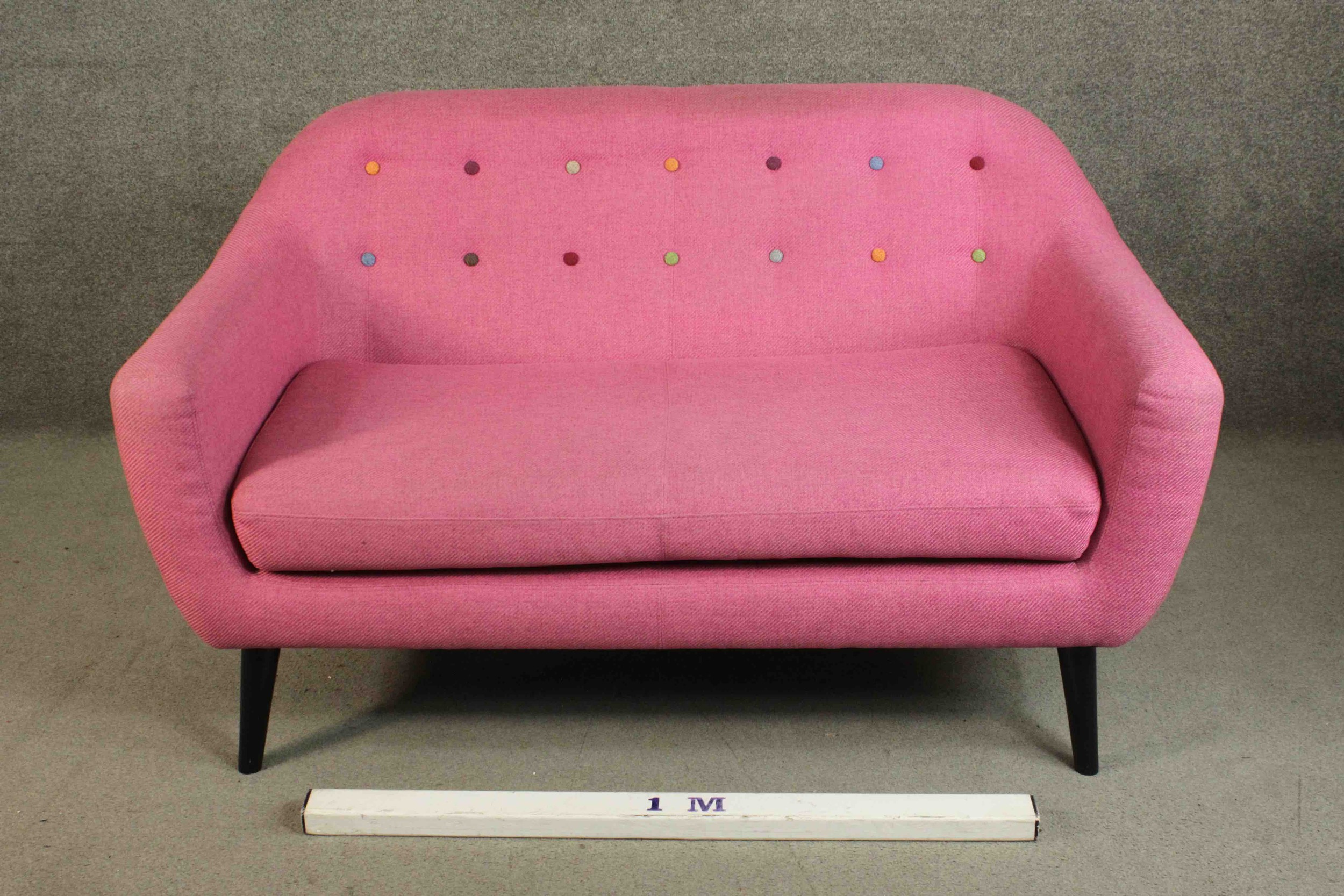 A contemporary Made.com Ritchie sofa, upholstered in pink with a polychrome buttoned back on - Image 2 of 8