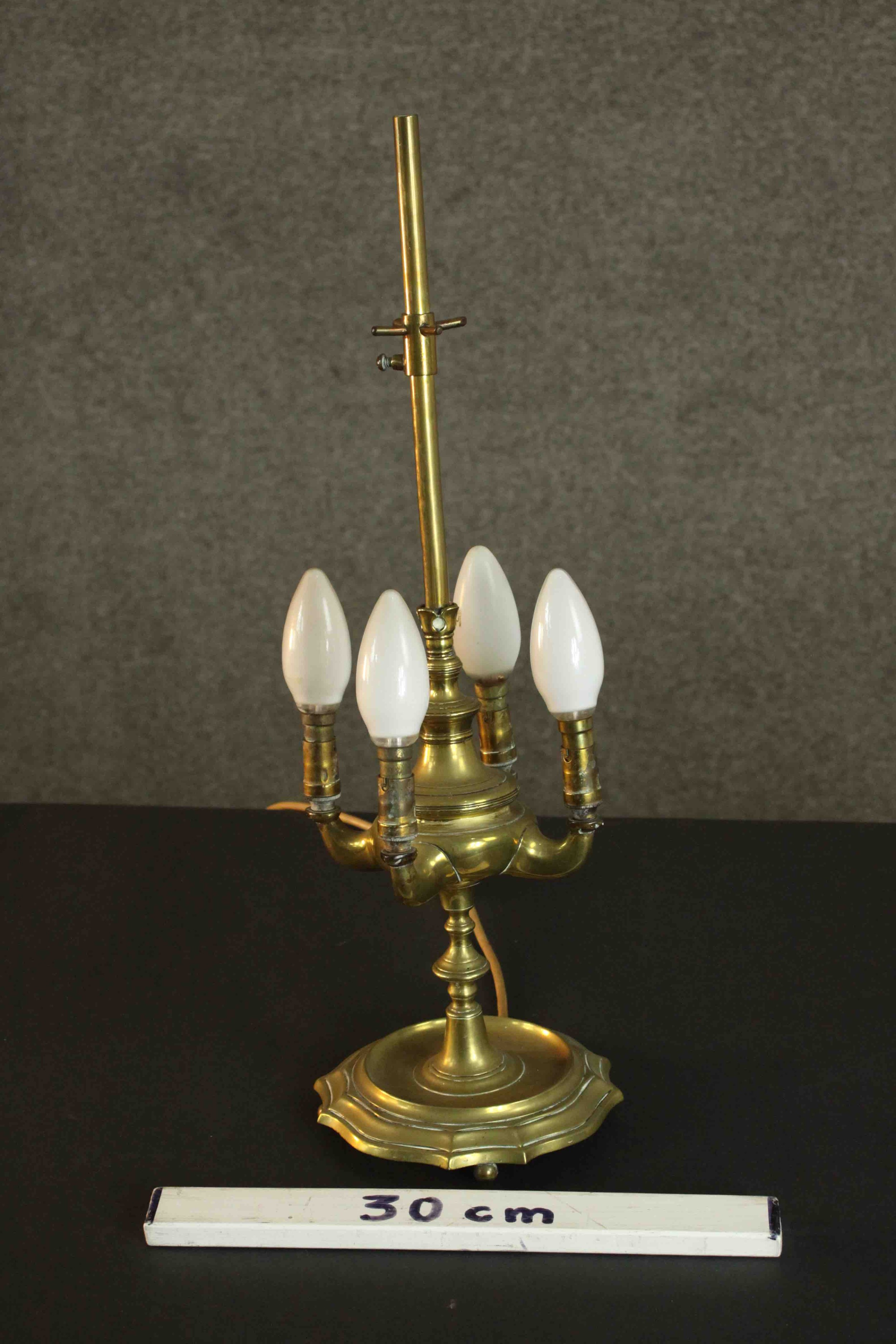 A 19th century brass four branch converted desk lamp on a ridged base. (one foot missing) H.50 Dia. - Image 2 of 7